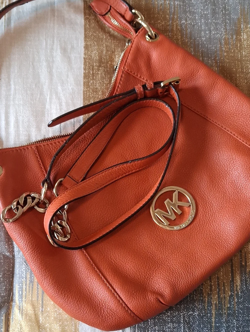 Michael Kors Orange Pebbled Leather Convertible Hobo Bag